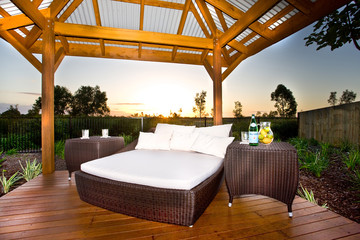 Garden gazebo with romantic bed
