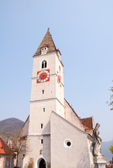 gothic bell tower of church in spitz, austria