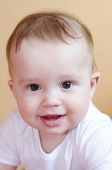 portrait of the smiling baby age of 7 months