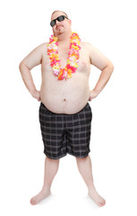 Obese traveler with hawaian flowers.