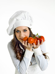 Smiling chef with italian tomatoes