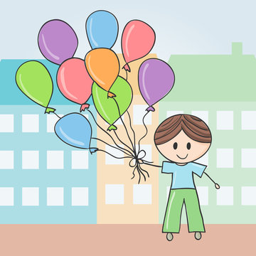 Boy with balloons in city