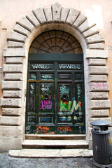 Fototapeta na wymiar Graffiti Doors in Rome