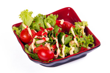 Salad with shrimps on a white background