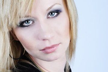 beautiful young blond woman with professional makeup