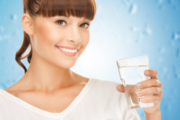 young smiling woman with glass of water