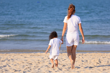 Asian family on beach