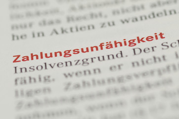 Zahlungsunfähigkeit Überschrift Definition in einem Buch