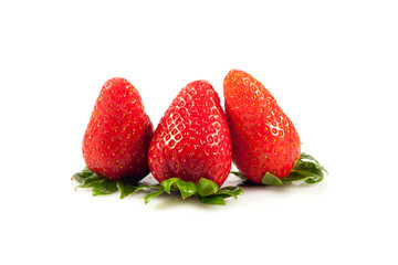 Strawberries with leaves. Isolated on a white background.