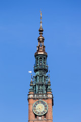 Fototapeta na wymiar Town Hall tower with a clock in Gdansk, Poland.