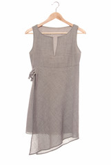 A grey tunic is on hanger.