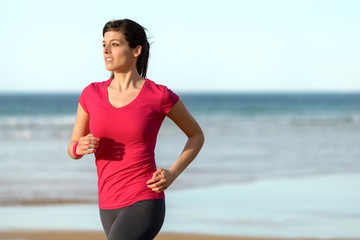 Woman running on beach