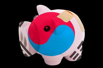 bankrupt piggy rich bank in colors of national flag of south kor