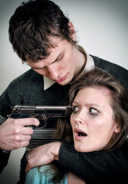 Man with gun threaten woman