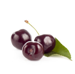 Red, juicy, ripe cherries isolated on the white