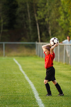 Fototapeta Young soccer player