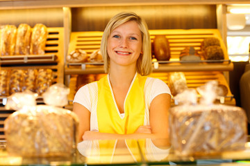 Bakery shopkeeper posing in shop
