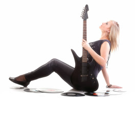 Woman with guitar headphones listening to music isolated white b