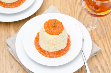 mousse of chicken with pumpkin, green and red pepper sauce