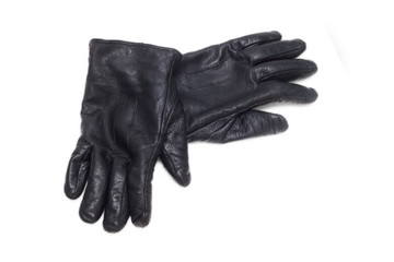 black pair leather gloves isolated on white background