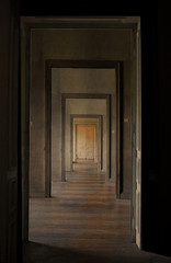 Closed door at the end of the hallway, rite of passage concept. - 51684026