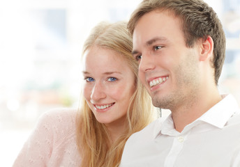 Portrait of a happy couple sitting together