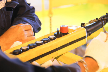 Lifting remote on hand worker