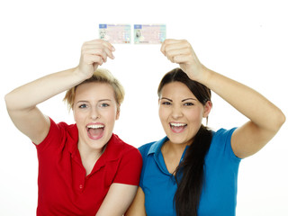Young women are so happy getting a driver licence