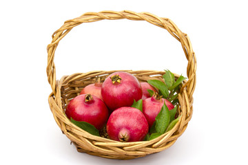 fresh pomegranates in a basket