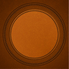 Leather background with round stitched labels