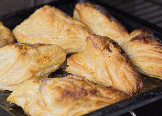 triangular cheese  pie in oven