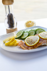 Baked Salmon with Sliced Lemons and Cucumbers Vertical