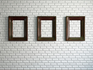 Three empty wooden frames