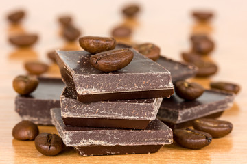 Chocolate  and coffee beans on the table