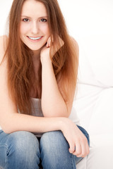 woman sitting on sofa