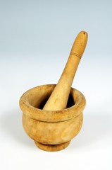 Wooden pestle and mortar © Arena Photo UK
