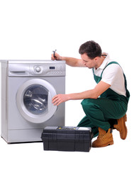 A repairman a washing machine