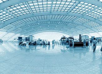 interior of the modern mall of beijin airport subway station