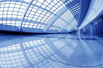 interior of the modern mall of beijin airport subway station
