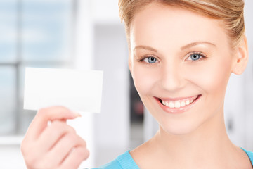 happy woman with business card