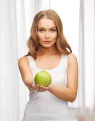 woman with green apple