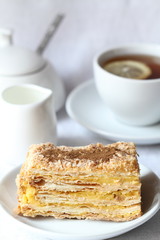 Cake Napoleon and cup of tea
