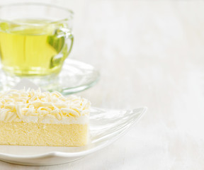 Cup of herbal tea and fresh cake
