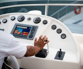 at the helm