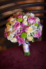 Beautiful wedding bouquet of fresh pink roses bridal flowers