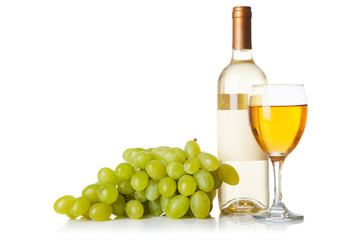 Bottle of white wine and grapes