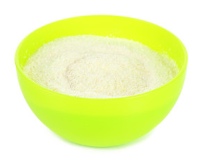 Powdered milk in bowl for baby isolated on white