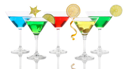 Alcoholic cocktails in martini glasses isolated on white