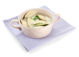 Tasty dumplings in .saucepan, isolated on white