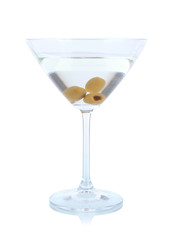 Martini glass with olives isolated on white.